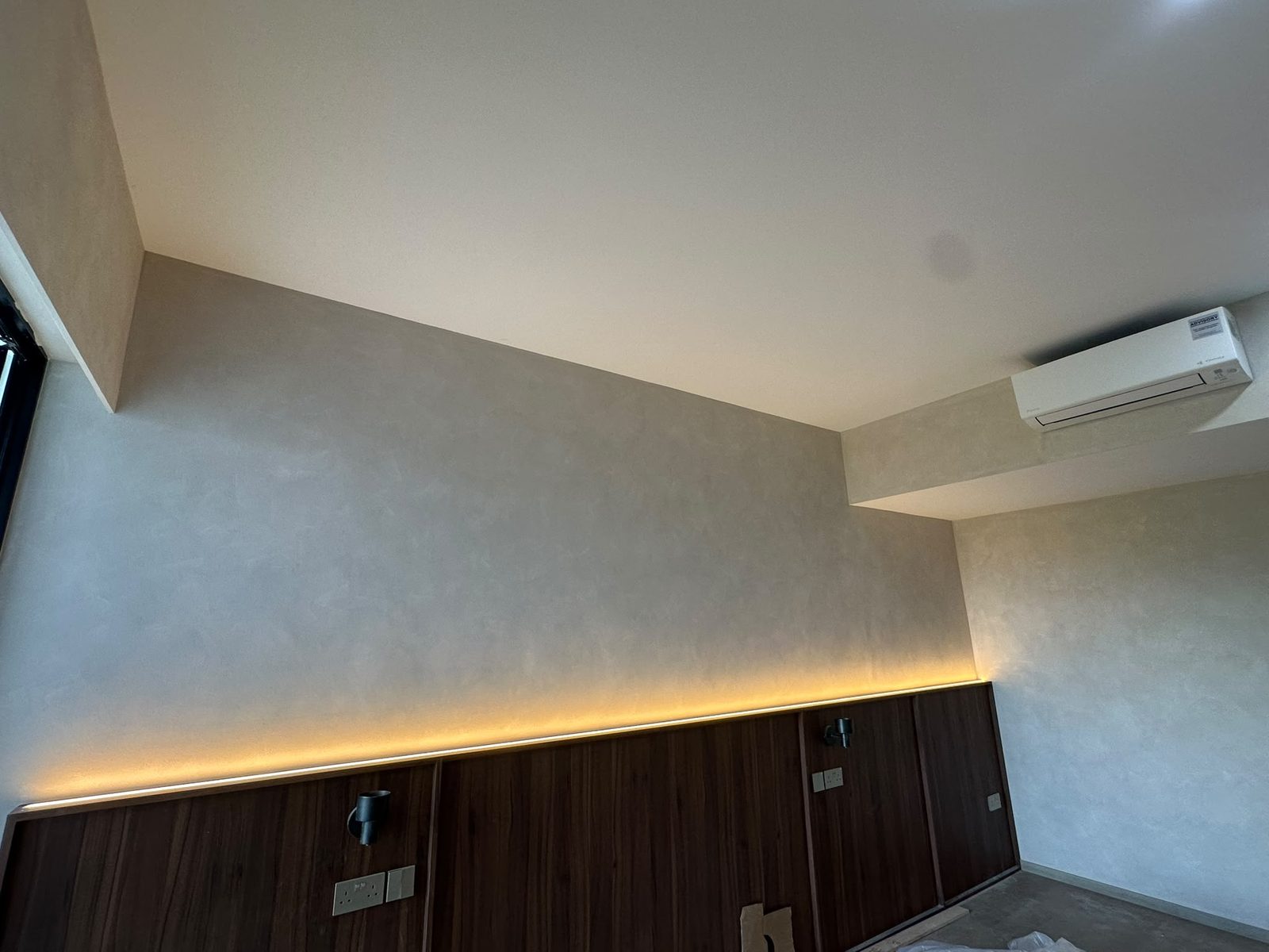 Limewash textured feature wall, Singapore condo living room