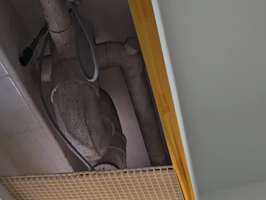 Mouldy bathroom pipes and ceiling before treatment, HDB Singapore