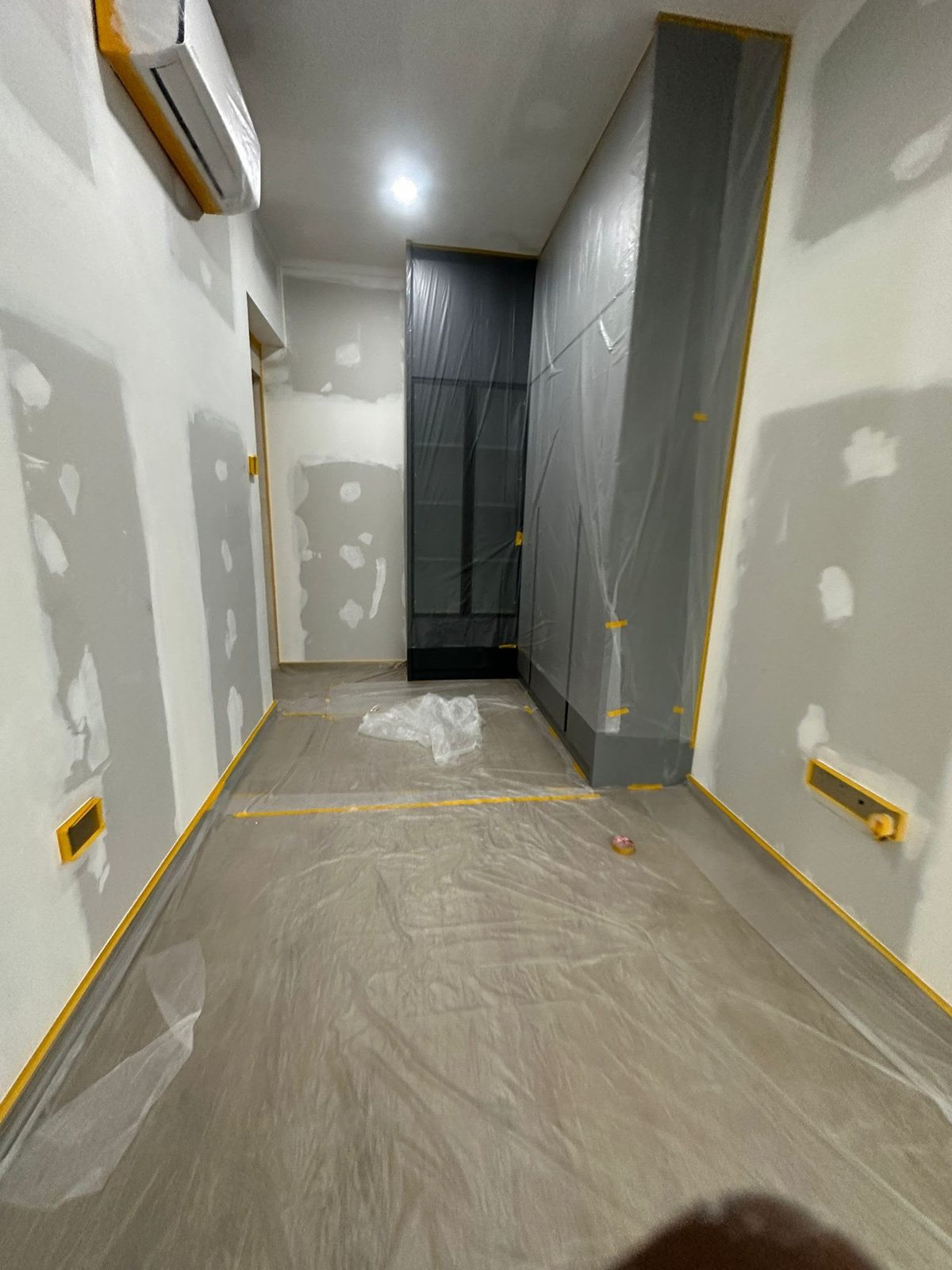 Patched and masked walls before repainting, HDB flat Singapore